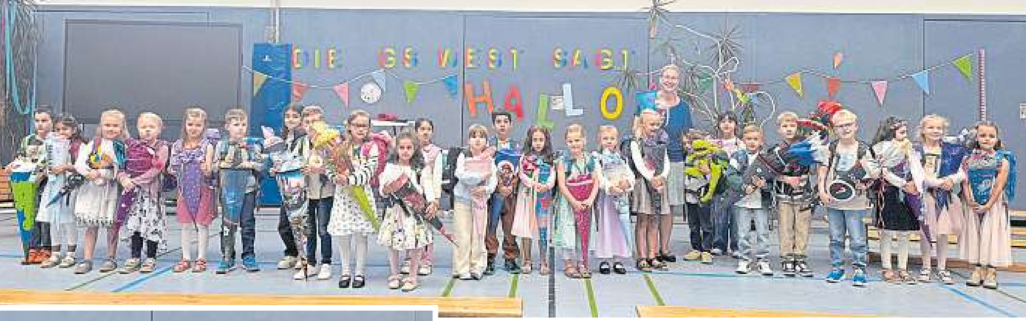 Die Klasse 1b mit ihrer Klassenlehrerin Sarah Roman