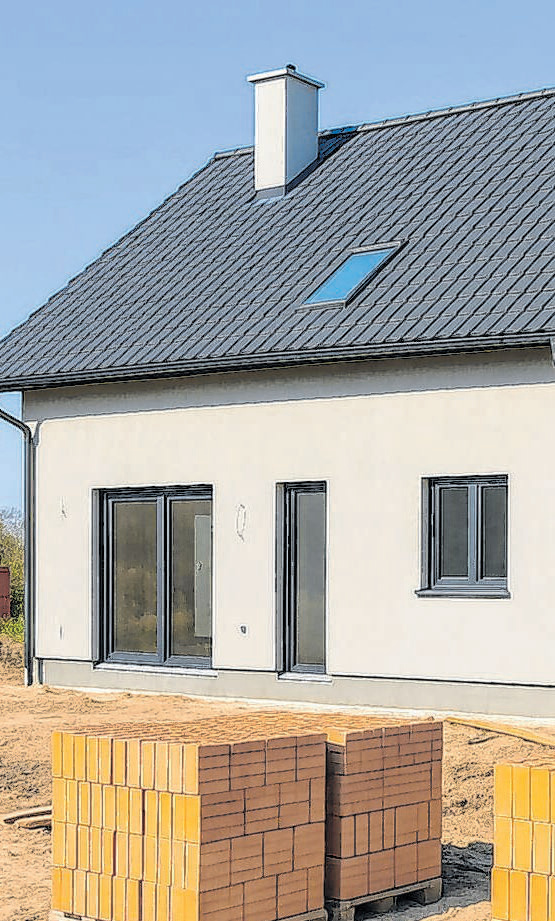 Schlüsselfertiges Bauen mit Freyer Fotos: Kl generiert