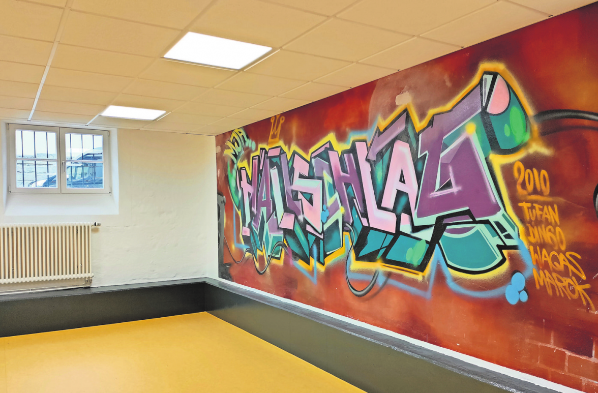 Das „Hallschlag“-Graffiti an der Wand wurde bei der Sanierung erhalten.