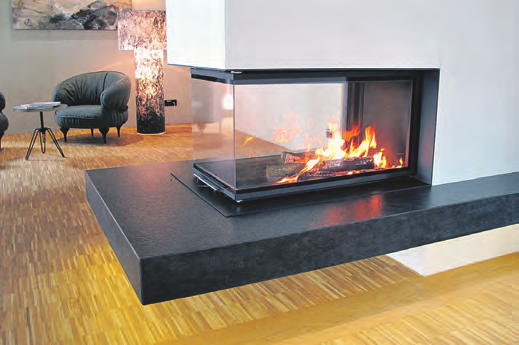 Schwebender Panoramakamin mit Feuertisch aus Naturstein Fotos: Innviertler Ofenbau