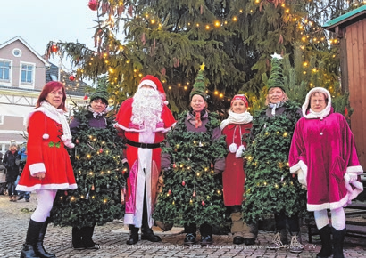 Der Weihnachtsmann freut sich auf jeden Besucher.