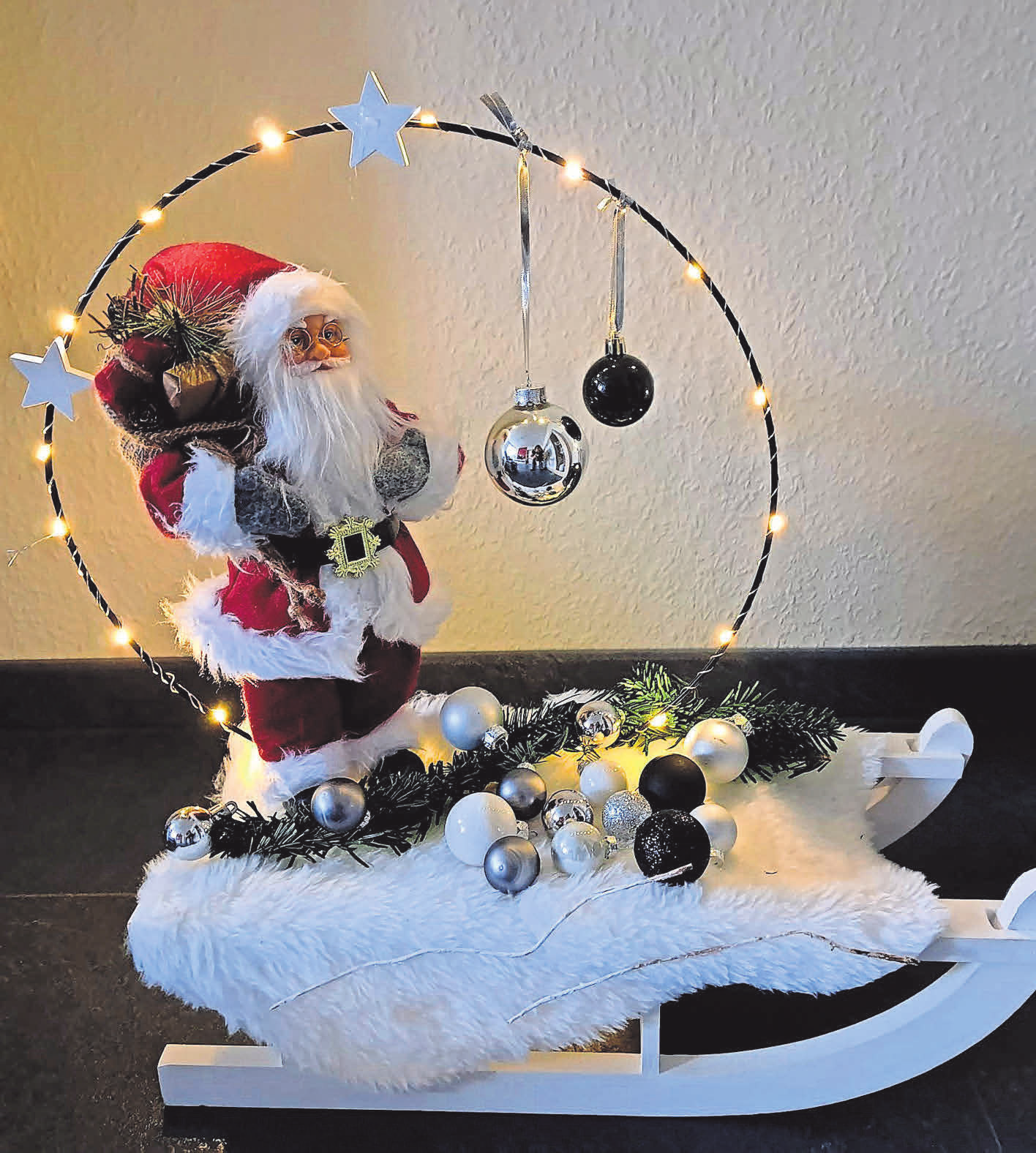 Ein Basteltipp von Kirsten Lange: Weihnachtsmann auf Schlitten.