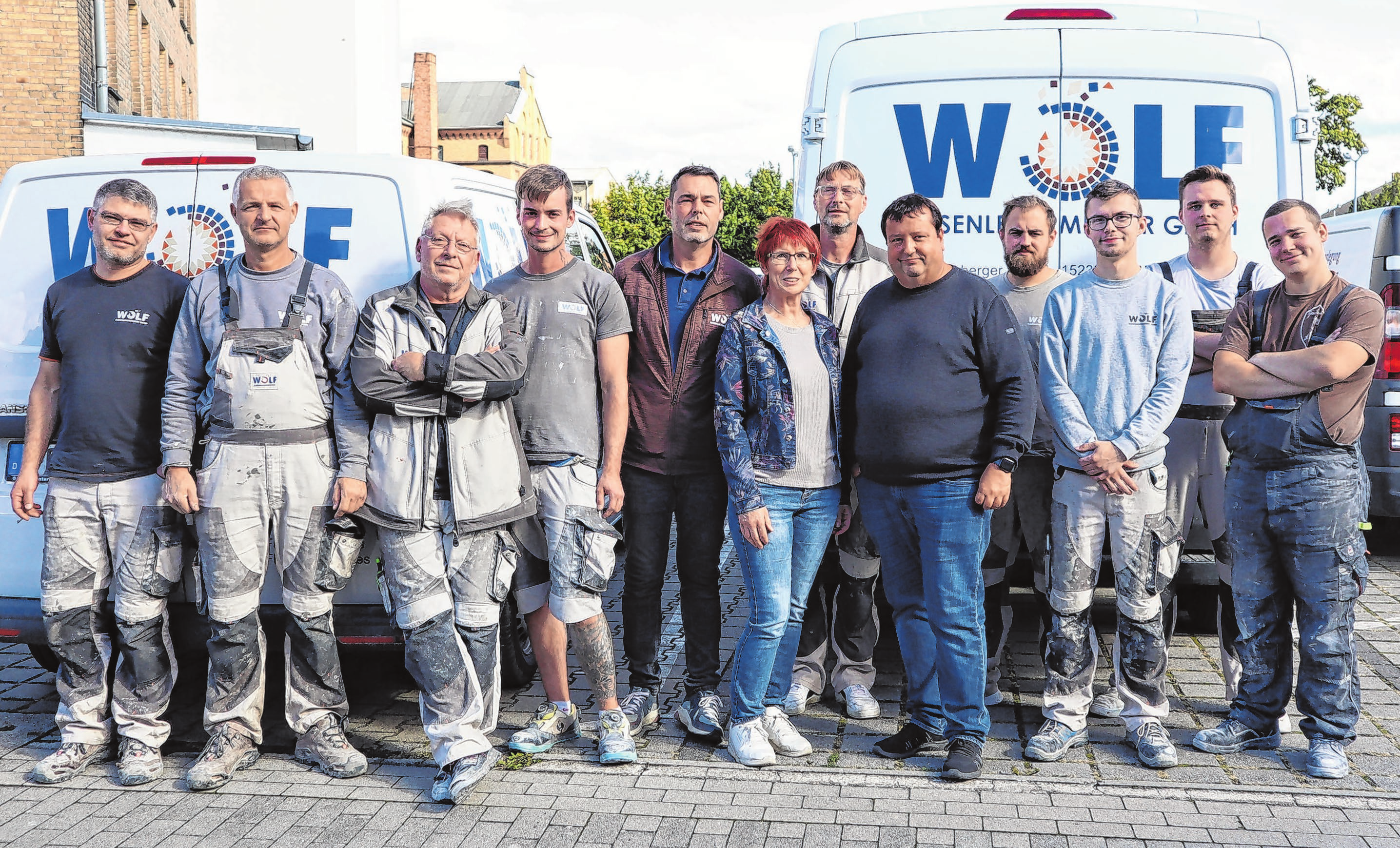 Arbeiten gern als Team zusammen: die Mannschaft der Frankfurter Handwerksfirma Wolf Fliesenlegermeister GmbH.