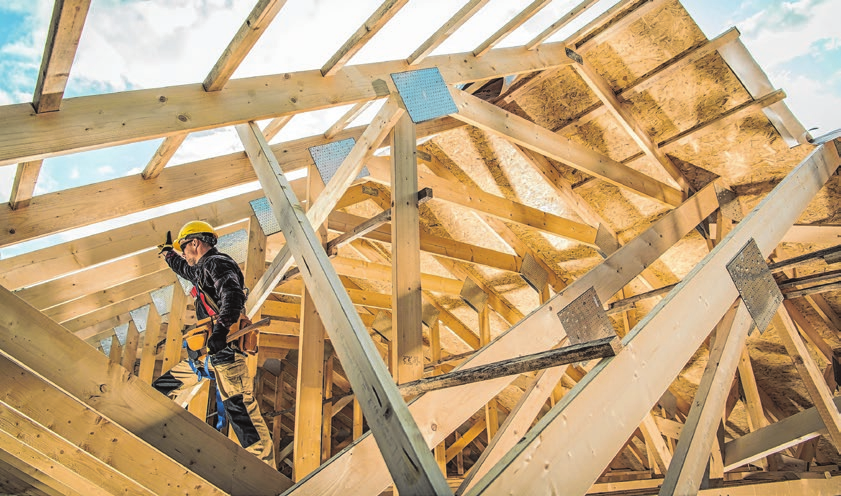 Nicht nur Dachkonstruktionen, ganze Häuser lassen sich aus Holz bauen. Foto: Tomasz Zajda/adobe.stock.com