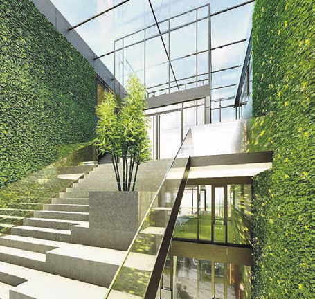 Grün ist nicht nur die Fassade. Auch in dem Office-Gebäude, das den Mitarbeitern optimale Arbeitsplätze bietet, sind ganze Wände begrünt.