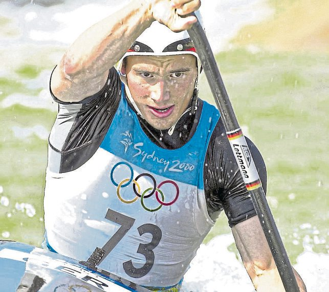 Kanu-Geschichte: Der damals 24-jährige Thomas Schmidt vom RKV Bad Kreuznach gewinnt bei den Spielen 2000 in Australien olympisches Gold im Kajak-Einer. Im Wildwasserkanal von Penrith fuhr Schmidt wie auf Schienen und dominierte die Konkurrenz. Er war außerdem Mannschaftswelt- und Europameister und sicherte sich achtmal den deutschen Meistertitel. Foto: picture alliance/dpa