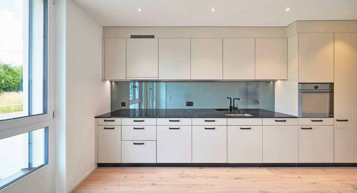 Integrierte Küchenzeilen in einem offenen Wohnkonzept. Bild: zvg